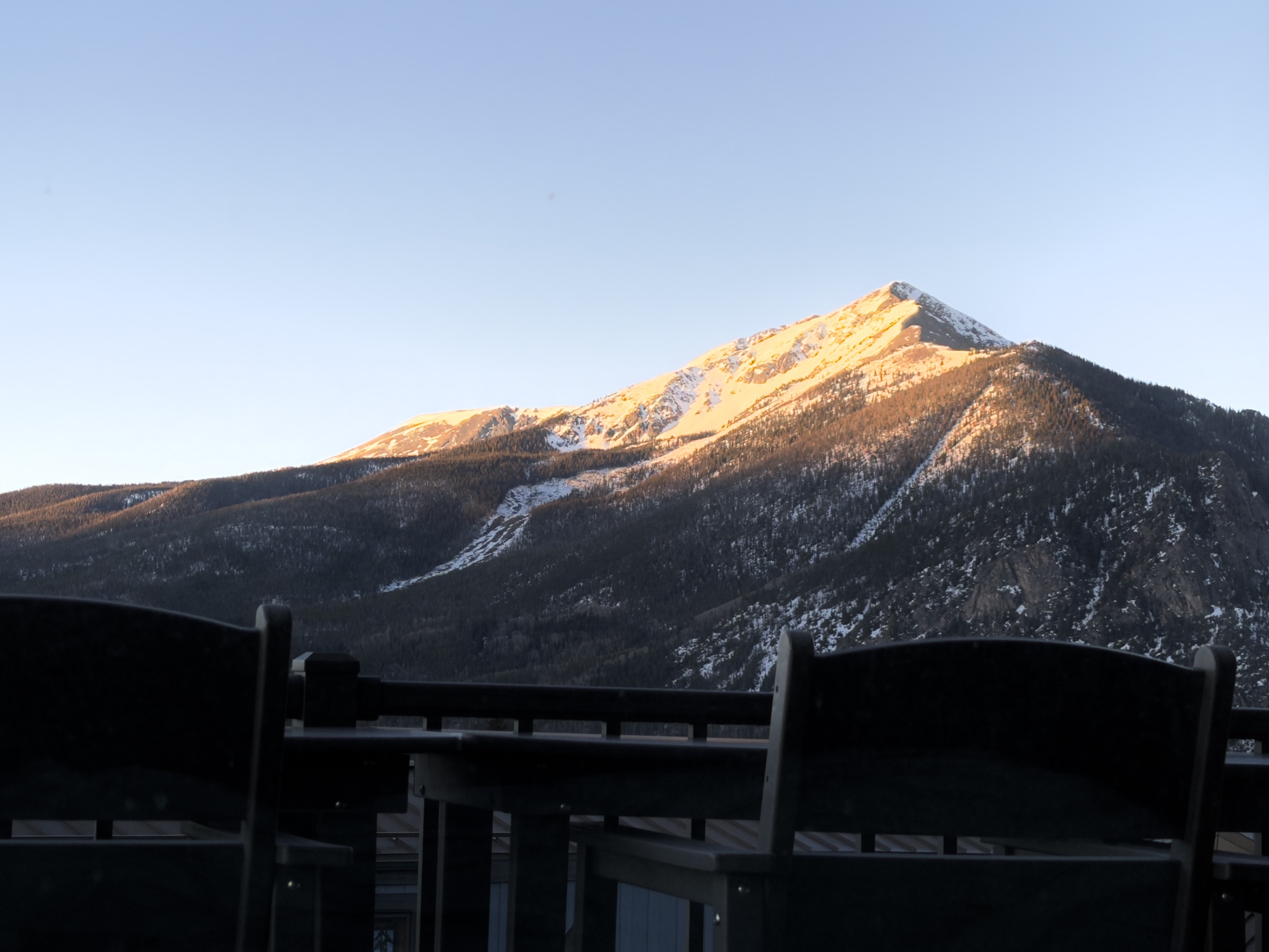 Balcony seating overlooking Dillon Reservoir and the Tenmile Range from The Eyrie