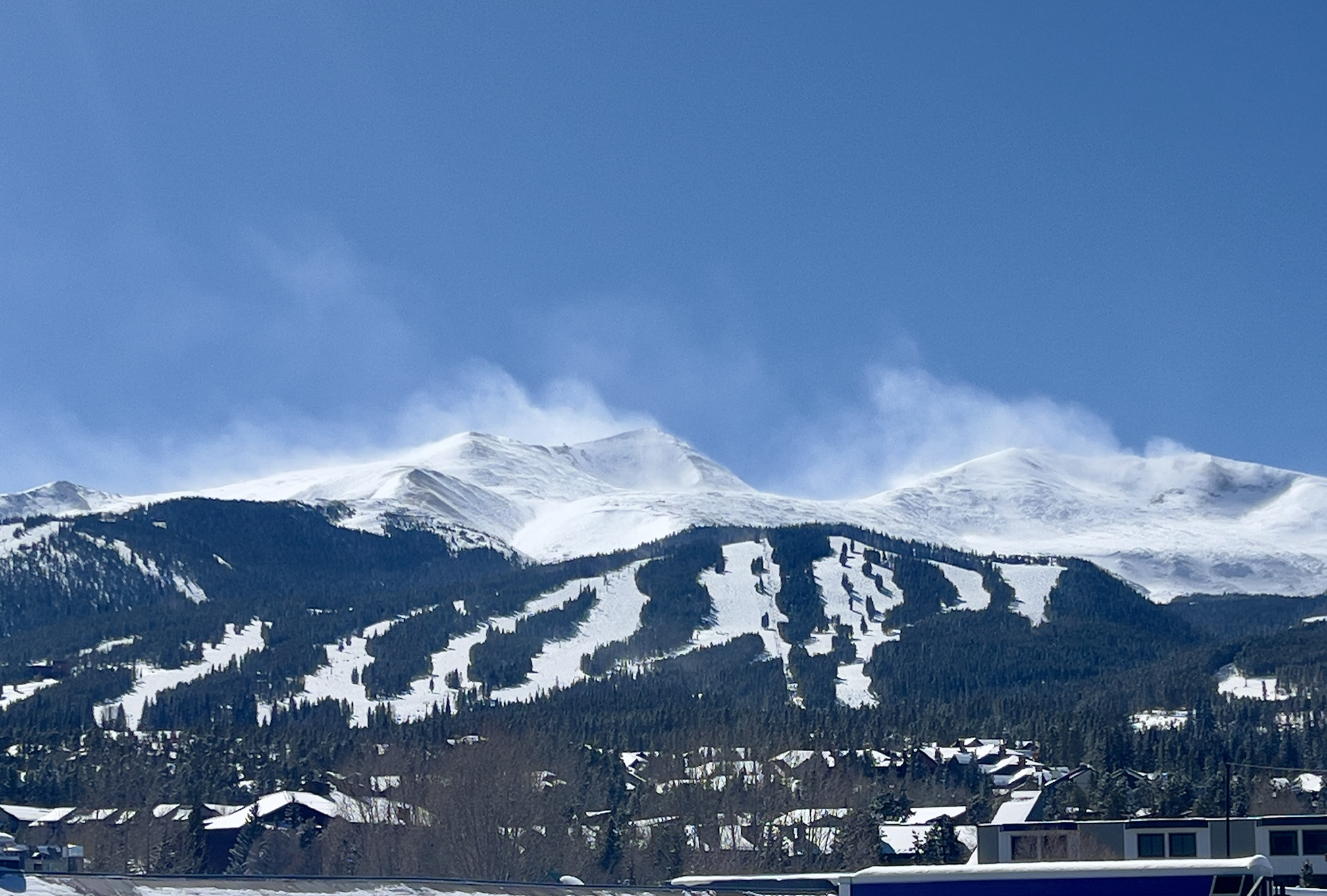 Skiers on a run in the Tenmile Range near The Eyrie